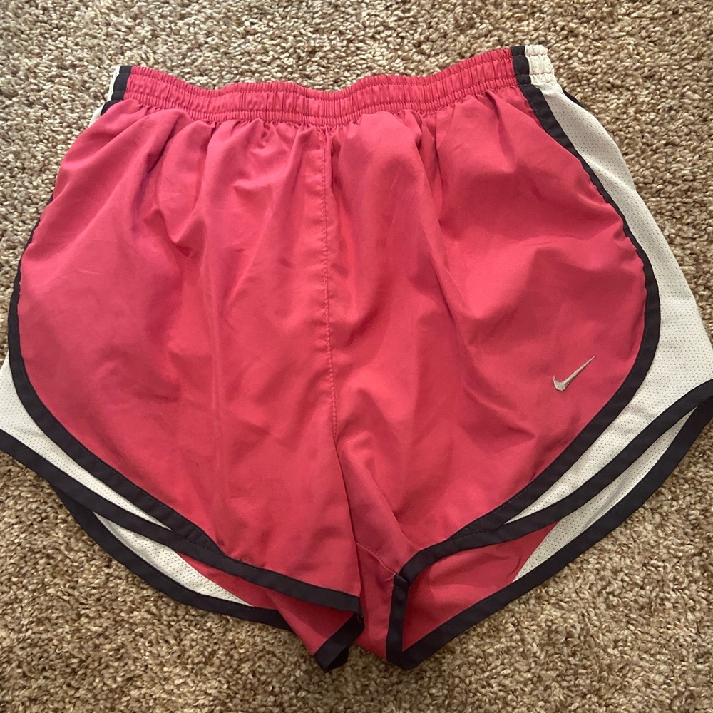 Pink and white nike shorts